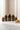 "Full Core Immunity System five supplement bottles on marble with capsules and botanicals — Sacred Health complete daily wellness"